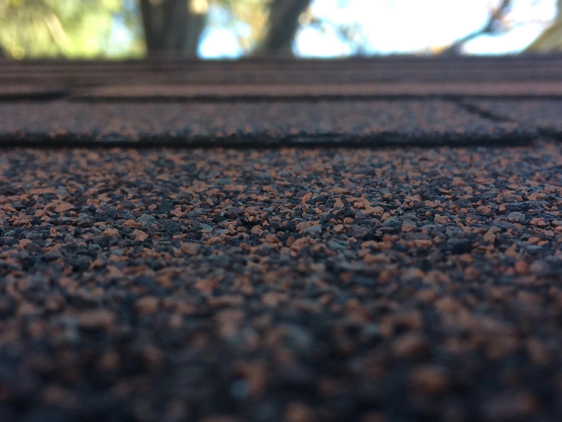 Granular roofing material viewed close up.